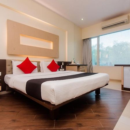 Hotel Capitol Thane Bagian luar foto