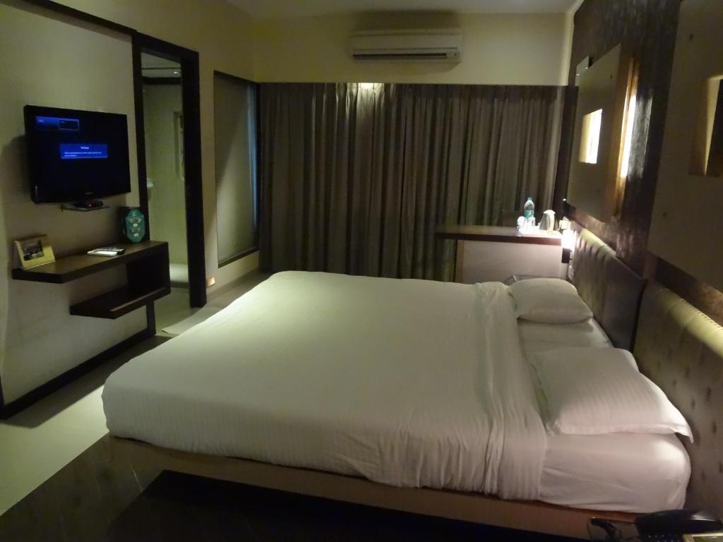 Hotel Capitol Thane Ruang foto