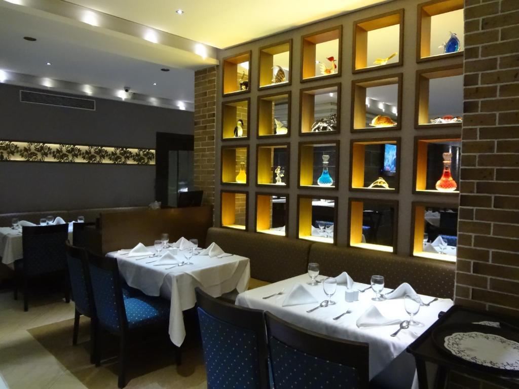 Hotel Capitol Thane Bagian luar foto