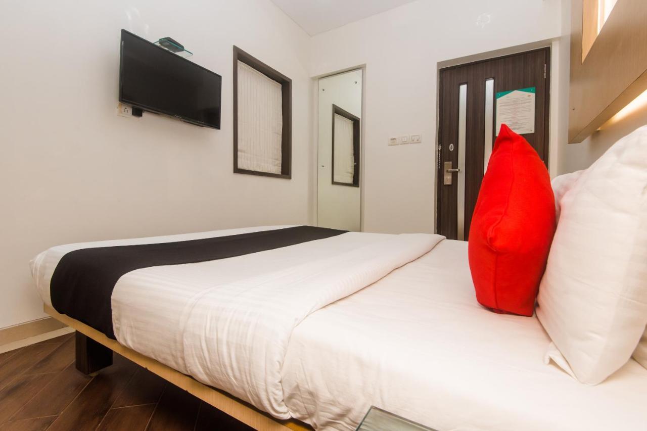 Hotel Capitol Thane Bagian luar foto